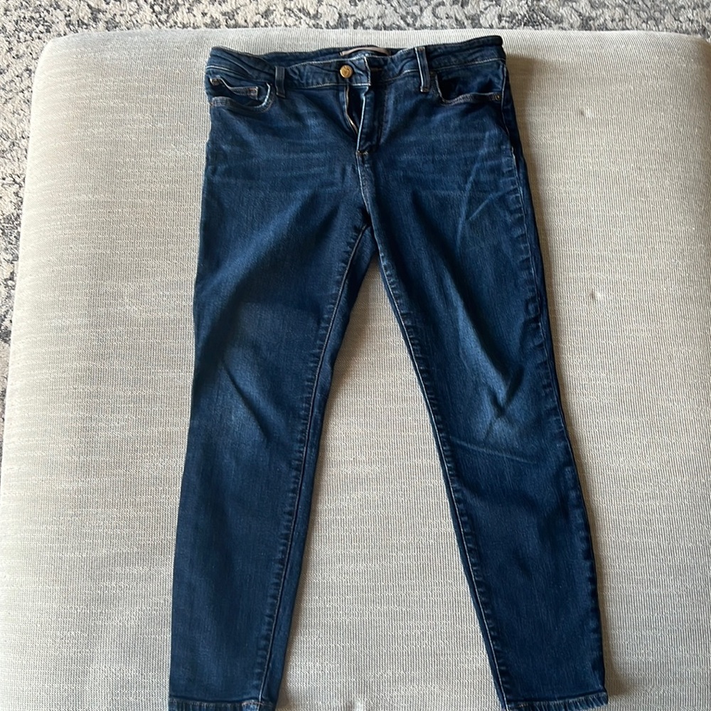 Skinnyish ankle jeans with a little stretch - hits at just above ankle bone 5"3.